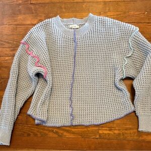 Cozy Gray Sweater with Colorful Accents